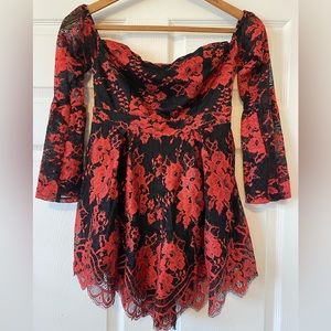Tiger Mist Zip up lace floral romper. Off the shoulder with bell sleeves.